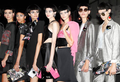 Milan Fashion Week: When Times Go Dark, Armani Goes Bright