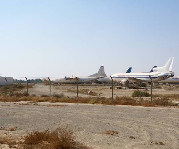 jets parked at an abandoned airport