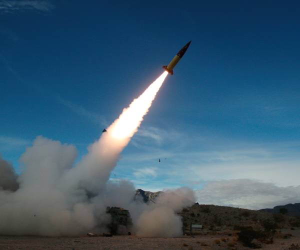 a just-fired long range missile in the air