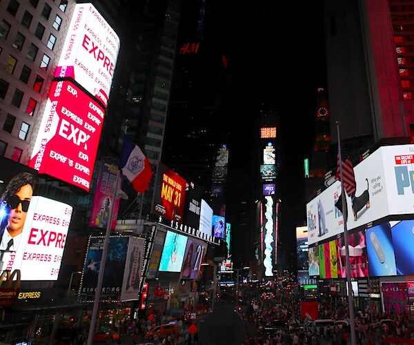 times square in new york city is packed with revelers