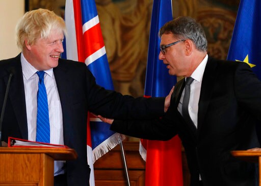 The Latest: Brexit: UK Envoy Says Money Linked to Trade Deal