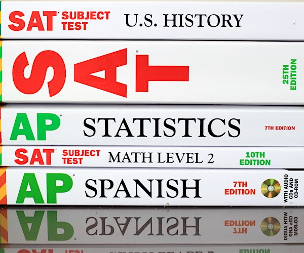 the sat graphic shown on the binders of college books history and math