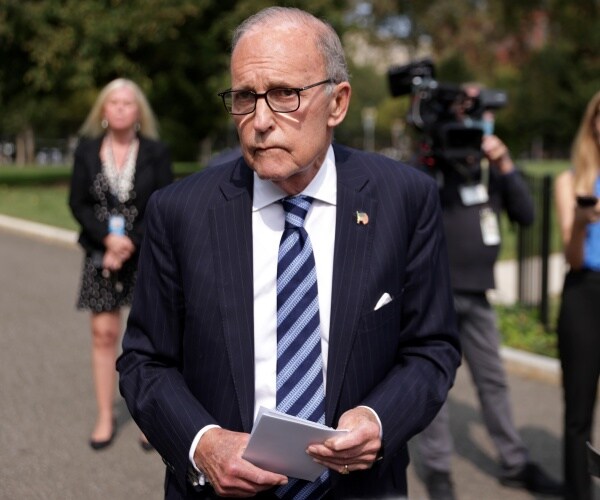 larry kudlow talks in driveway