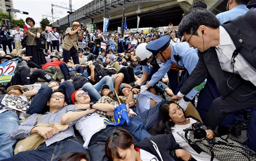 Protests Delay Vote by Japan's Ruling Bloc on Military Bills
