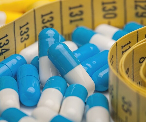 capsules and a measuring tape 