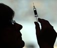 Experts Call Low Police Vaccination Rates a Public Risk