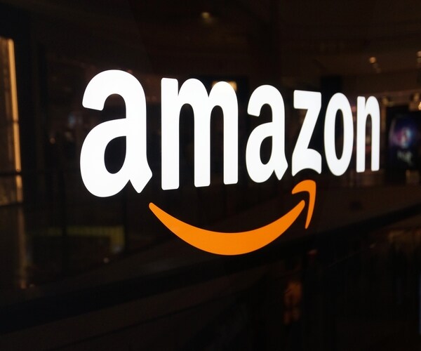 amazon logo on black shiny wal