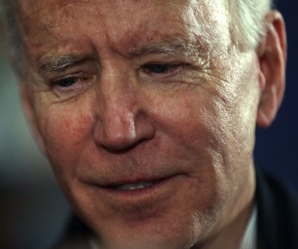 Former Vice President Joe Biden looks on during a campaign event in New Hampshire
