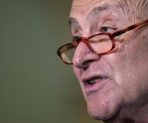 closeup of chuck schumer with bifocals resting on nose