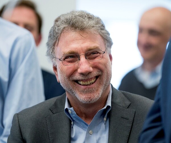 marty baron smiles in newsroom
