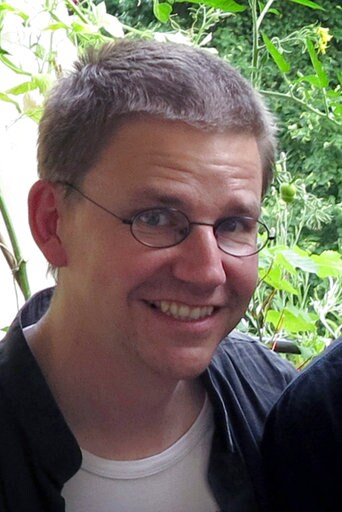 The Latest: Turkish PM Downplays Tensions with Germany