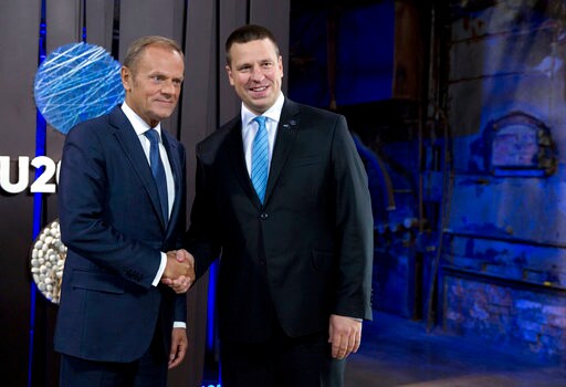 The Latest: France's Macron Says Brexit Not Really Divorce