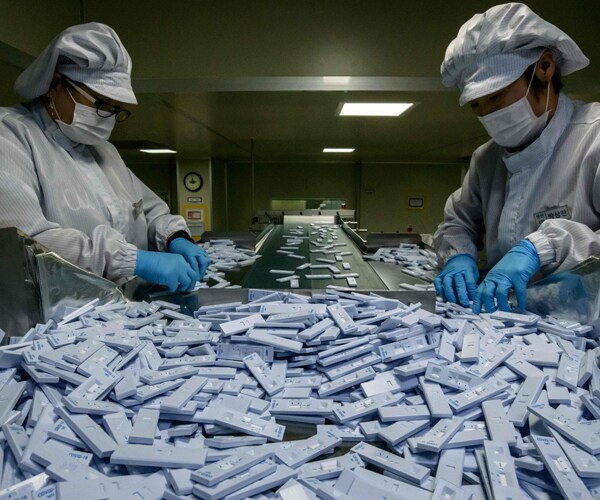 virus test kits on the production line at a manufacturing facility in south korea