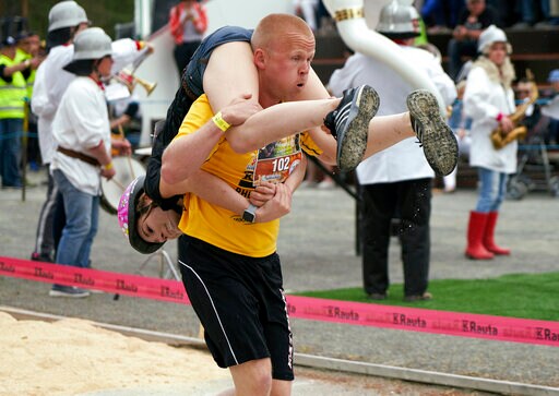 Lithuanian Couple Crowned 'wife Carrying' World Champions