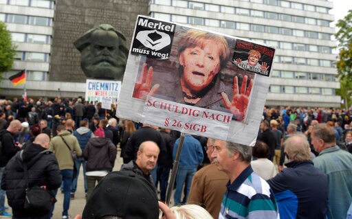 The Latest: German Far-right Groups Stage 'mourning March'