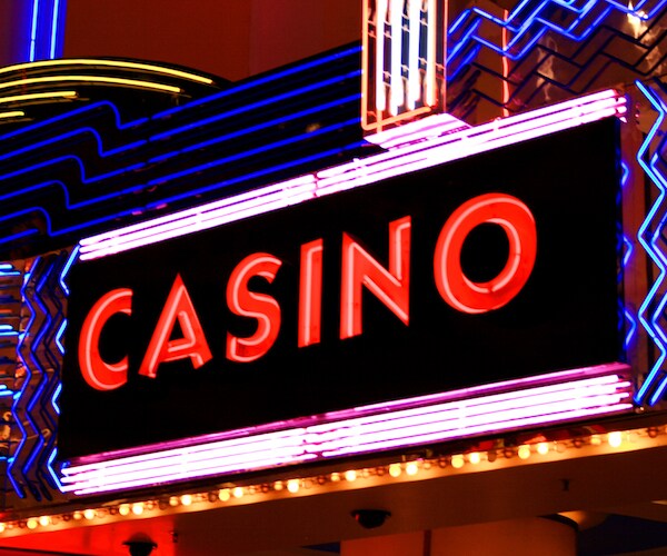 a picture of casino sign neon lights