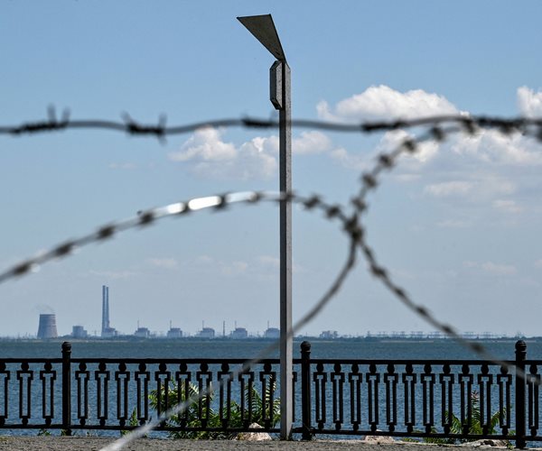 nuclear plant seen across a body of water