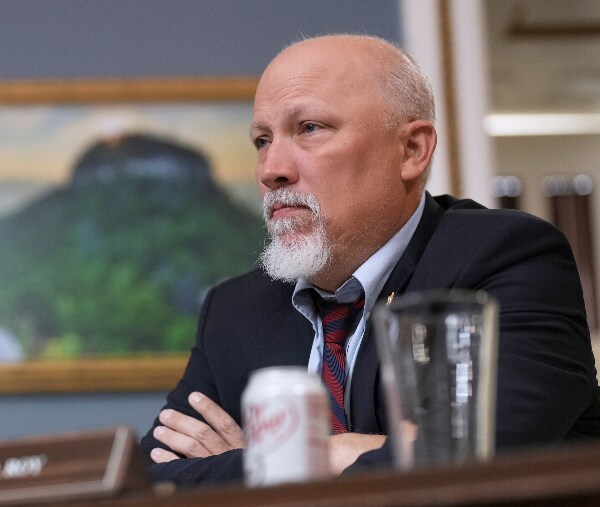 Chip Roy looks on at a hearing