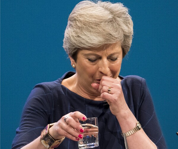 Theresa May Coughing: Speech Marred by British PM's Fit, Prankster