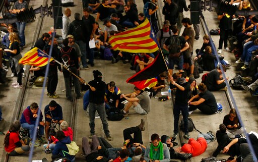 The Latest: Catalan Activists Return to Scene of Violence