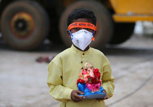 India Eases Virus Restrictions as Cases near 3.7 Million