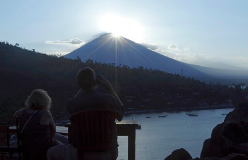 The Latest: Evacuees Get Meals at Temporary Camps on Bali