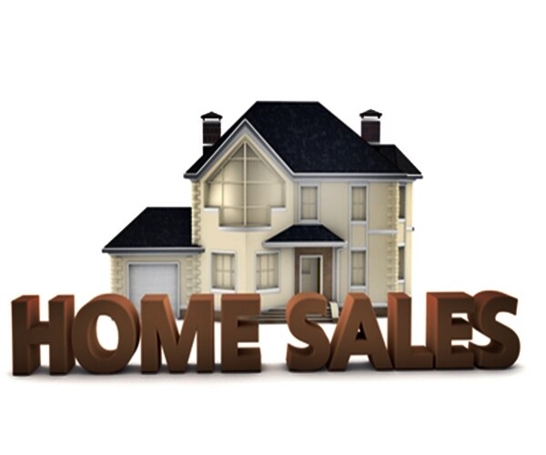 graphic depicting the words home sales in front of a model home 