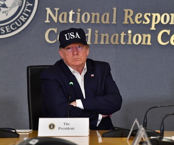 president donald trump receives a briefing on hurricane dorian