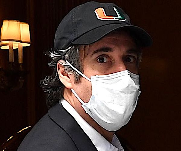 michael cohen left prison wearing a face mask