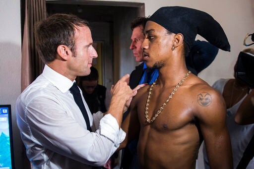 Macron Criticized for Photo with Teen Making Obscene Gesture