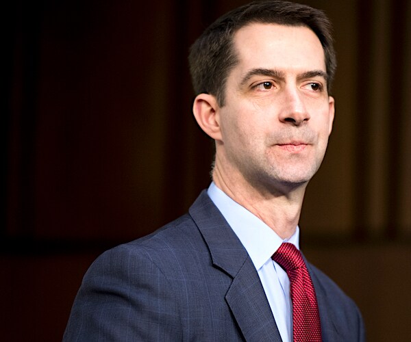 tom cotton walks out of the halls of congress