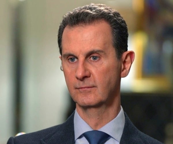 Whereabouts of Syria's Assad Unknown with Army Officers Saying He Boarded Flight