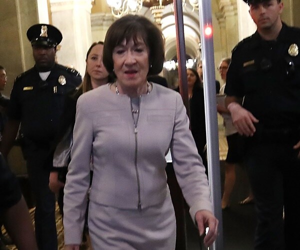 sen. susan collins walks into the capitol