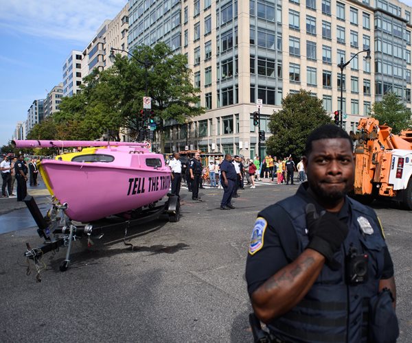 Climate Activists Block Traffic in US Capital, Chain Themselves to Sailboat