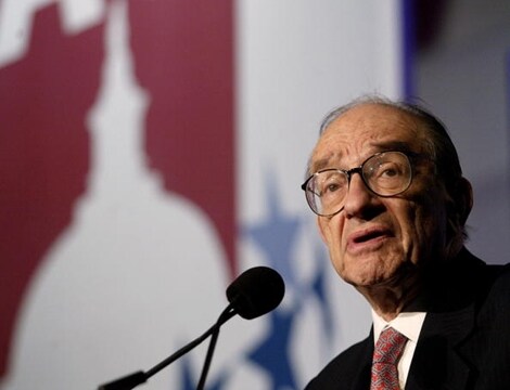 former fed chairman alan greenspan delivering a speech looking to right