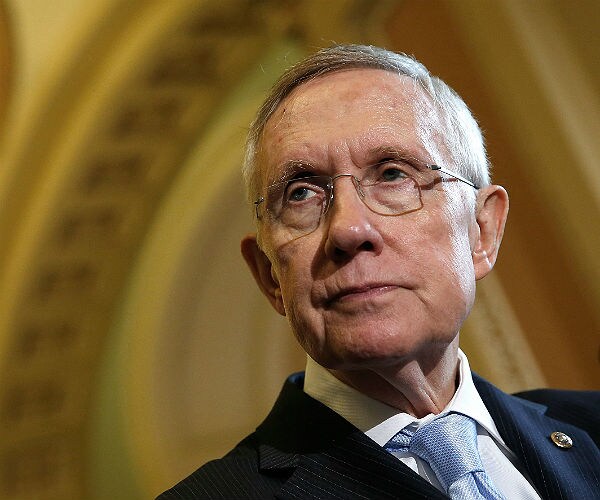 Harry Reid Tells Sanders to Condemn Supporters' Violence