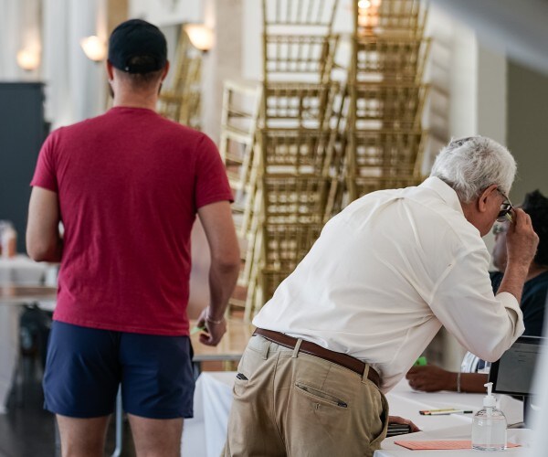 Voters in Georgia wait to cast their ballots Tuesday