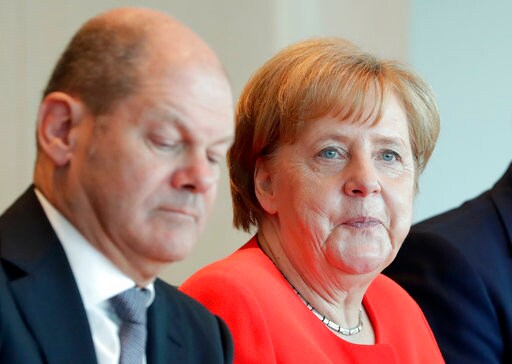 Germany's Merkel Backs Restraint with Italy's Populist Govt