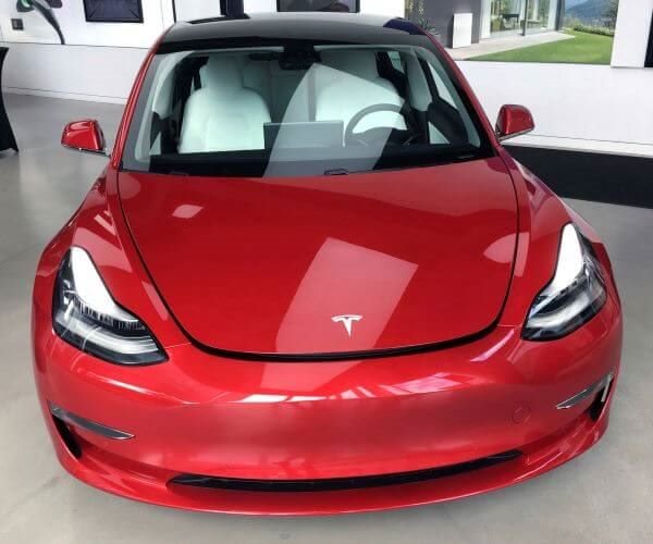 Tesla Lifts Nasdaq to Record Territory: 15,564