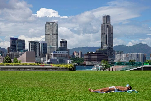 Asia Today: Chinese City Tightens Rules, Victoria Might, Too