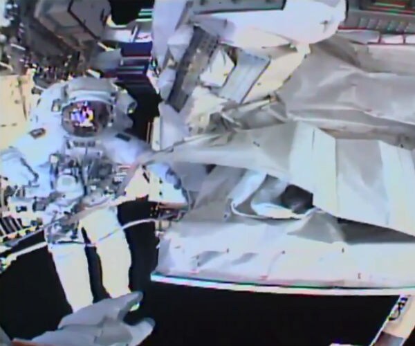 Spacewalking Astronauts Plug Leak, Finish Fixing Detector