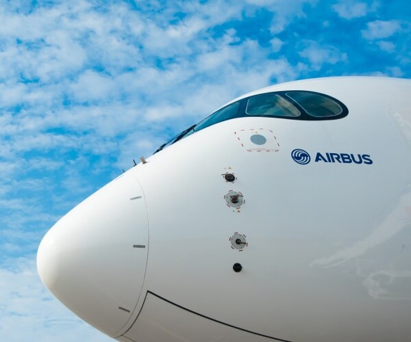 airbus plane is shown with logo
