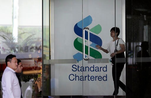 Singapore Fines Banks for 1MDB Fund Links