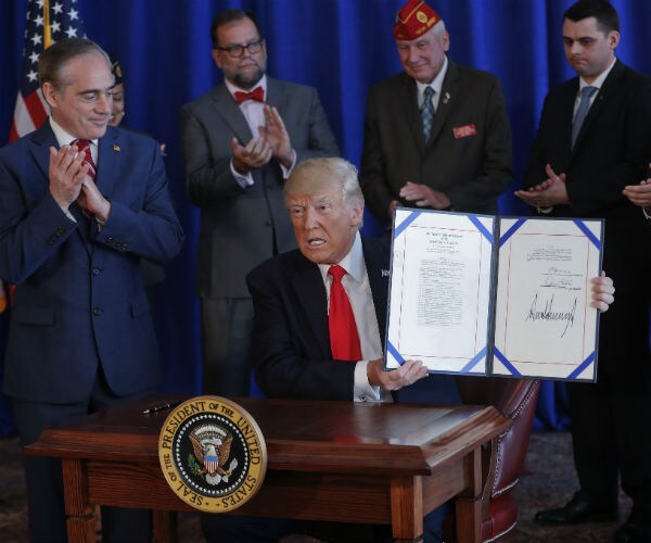 Trump Signs Bill to Fund Veterans Medical Care Program