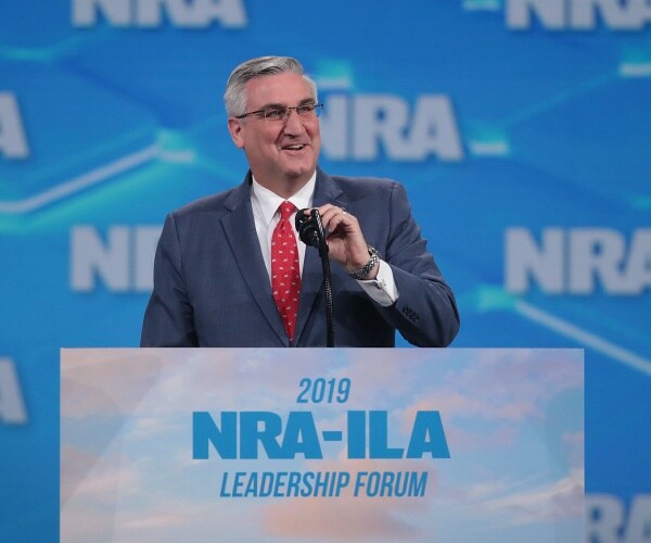 Eric Holcomb speaks to guests during the NRA-ILA Leadership Forum
