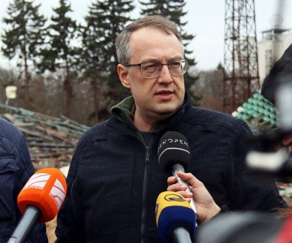 viacheslav chaus speaks into a microphone