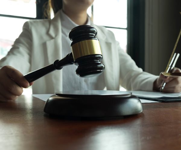 Shearman & Sterling Lays Off Lawyers & Staff