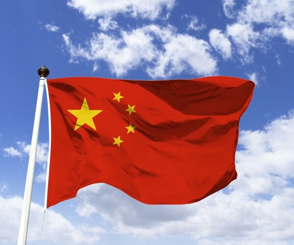 Chinese flag waving in the wind