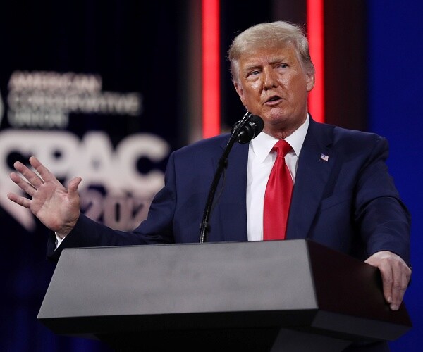 donald trump speaks from podium