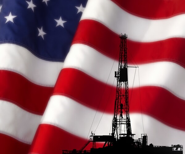 energy rigs amid american flag backdrop
